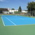 Court de tennis revêtement beton poreux teinté dans la masse bi couche